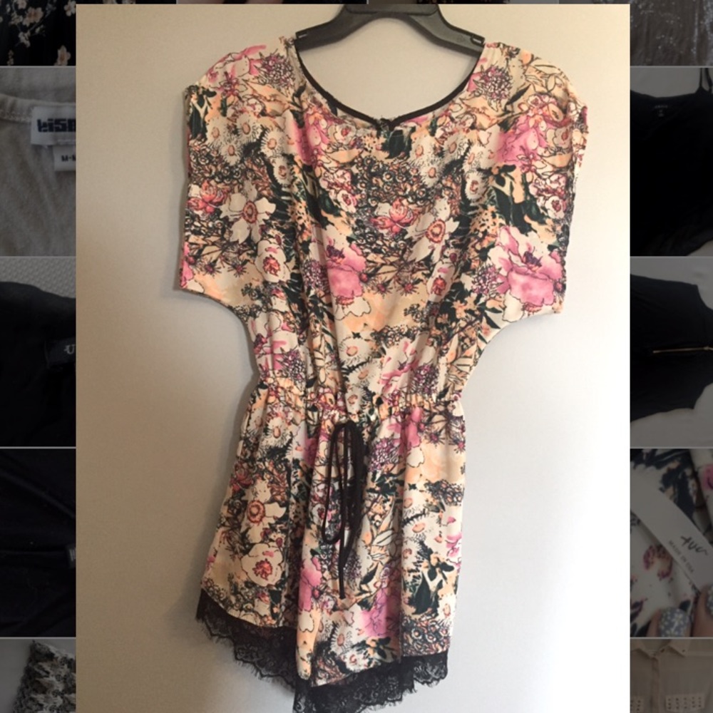 Super soft romper with lace trimming.